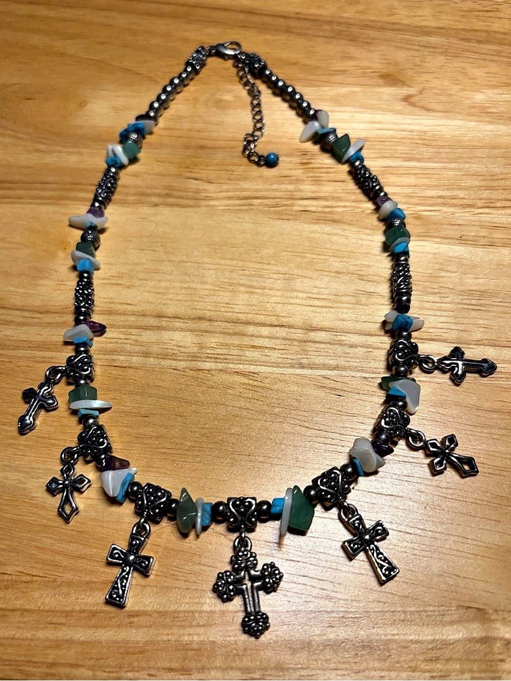 Set of 2 Cross Necklaces. One Silver tone with beads and the other silver tone w